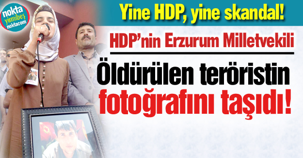 Teröristin fotoğrafını taşıdı!