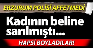 Kadının beline sarılmıştı...